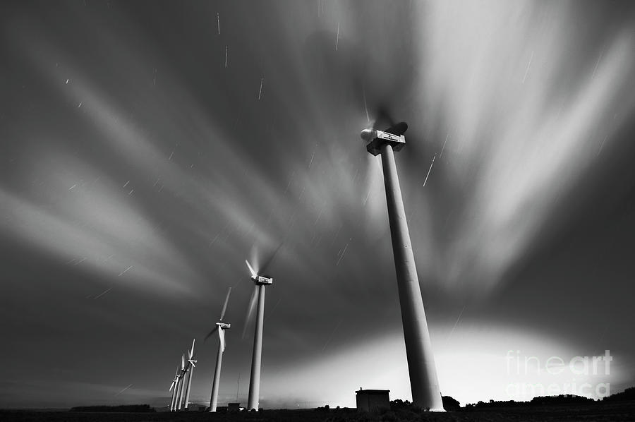 Star light trails and wind turbines Photograph by Neale And Judith Clark