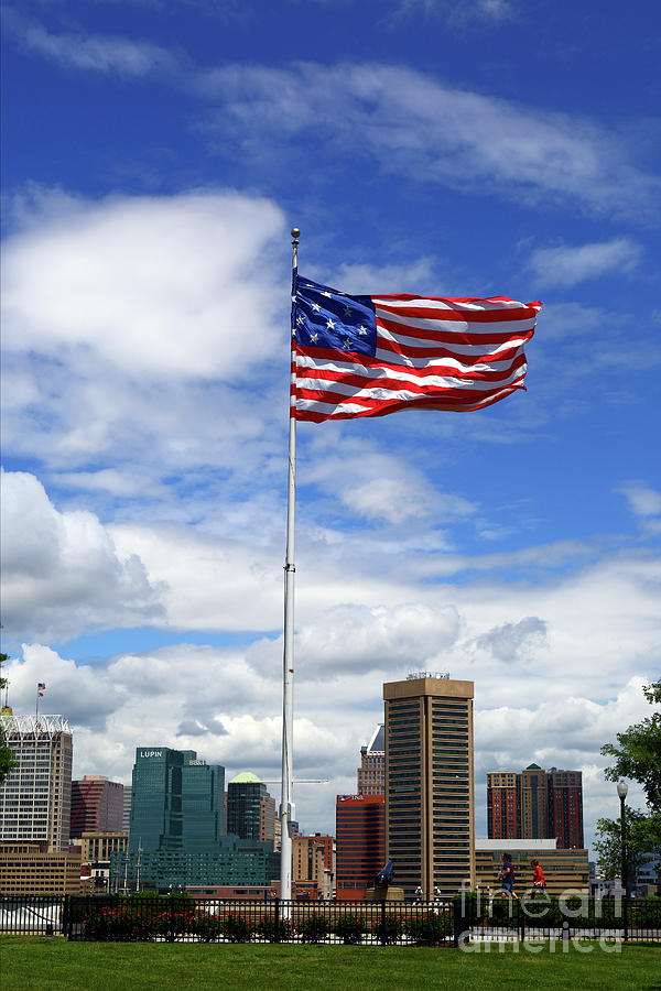 Star Spangled Banner and Baltimore skyline Photograph by James Brunker