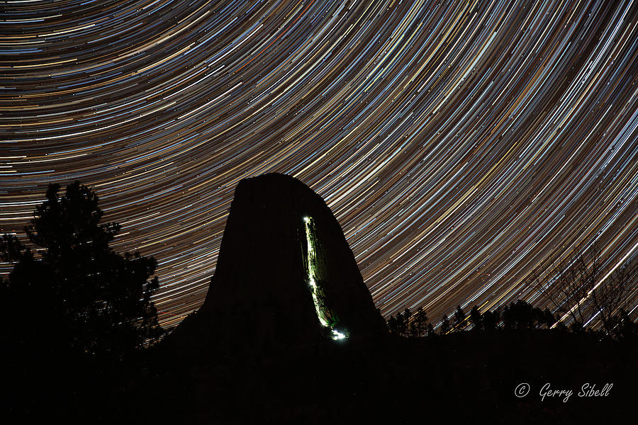 Star trails Over Devils Tower Photograph by Gerry Sibell