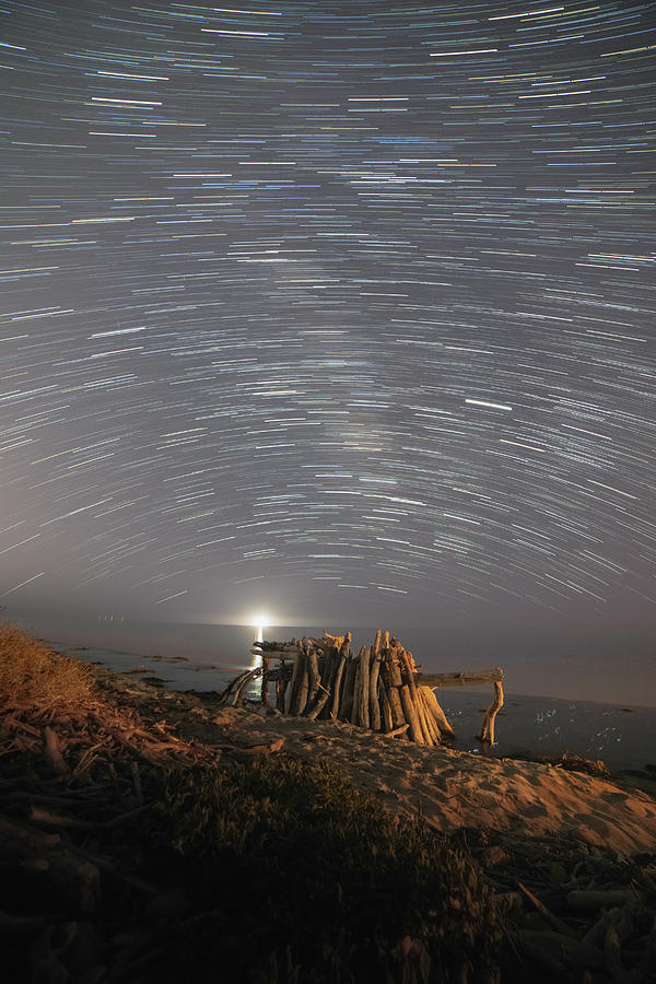 Star Trails over Driftwood Teepee Photograph by Lindsay Thomson