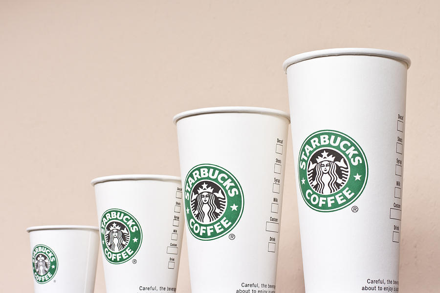 Starbucks Paper Coffee Cups Photograph by Sndr