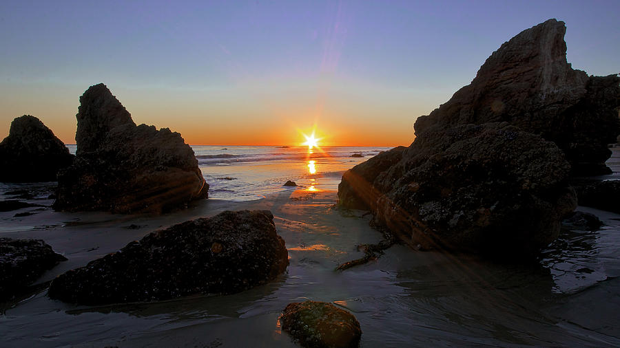 Starburst Sunset Photograph by Matthew DeGrushe