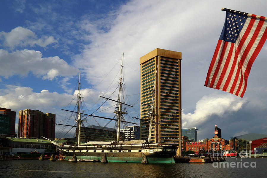 Stars and Stripes and Inner Harbor Baltimore Photograph by James Brunker
