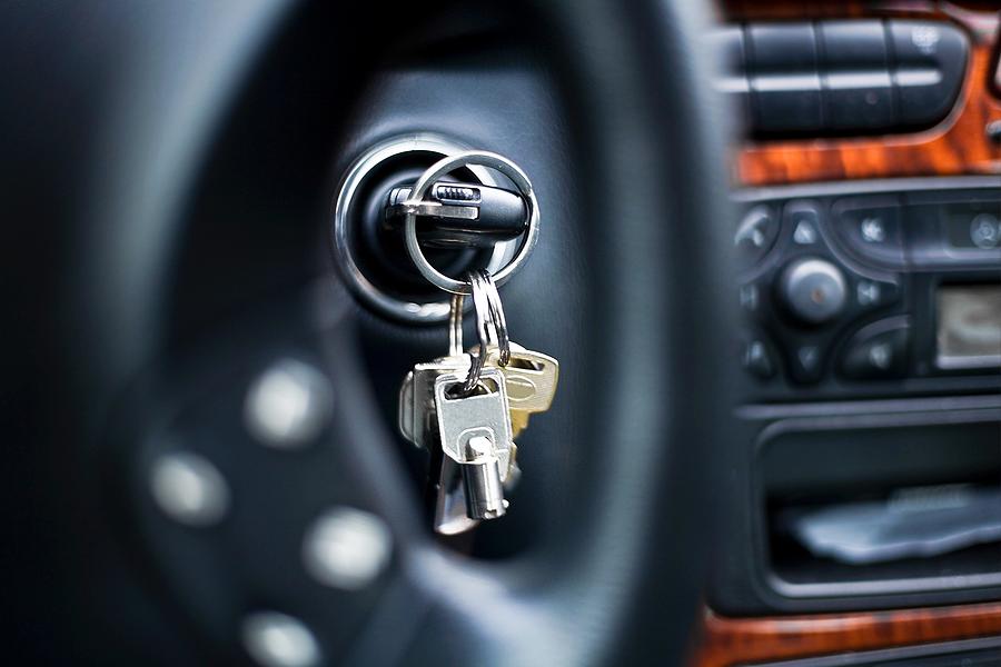 Starting The Car - Car Key In Ignition Lock Photograph by Deepblue4you