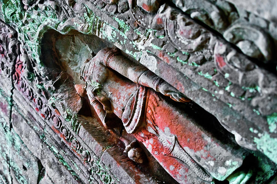 Statue carved on Angkor temple walls. Cambodia Photograph by Lie Yim