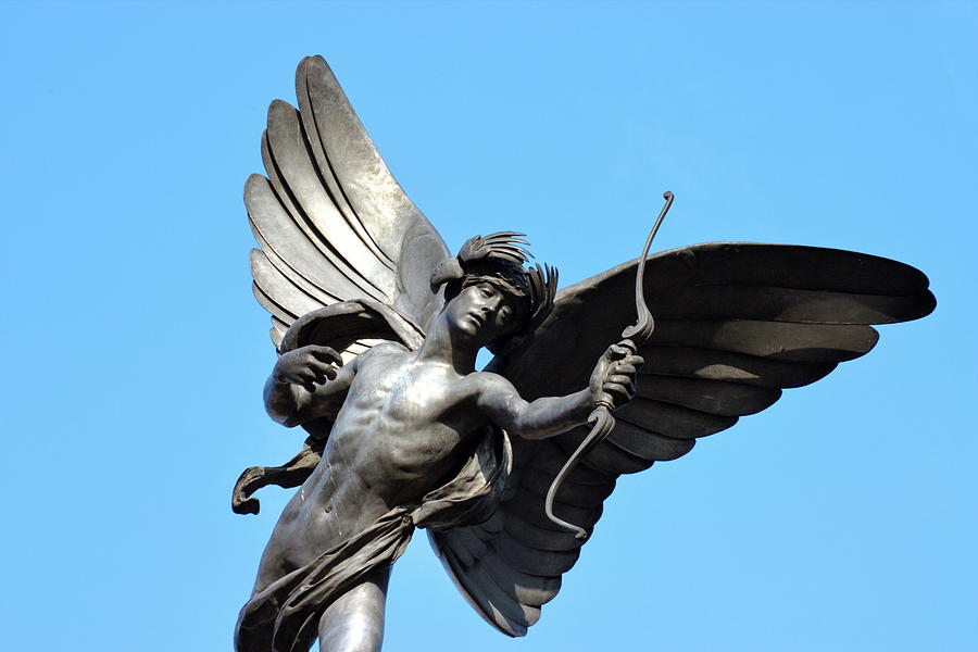 Greek Photograph - Statue of Eros, Piccadilly Circus, London. A low angle view of t by Luigi Petro