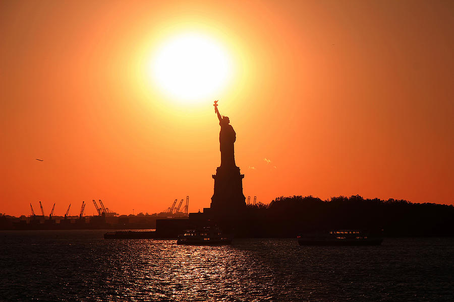 Statue Of Liberty And Sun Photograph by Andrew Fare