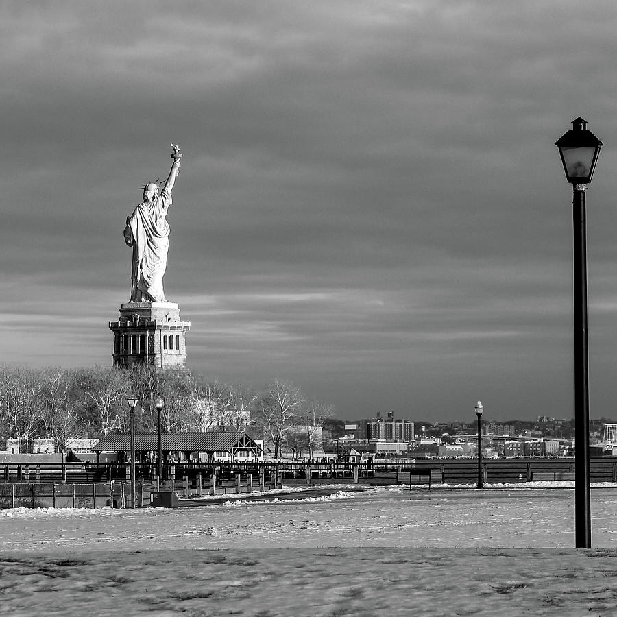 Statue of liberty in a snowy day NYC Photograph by Habib Ayat