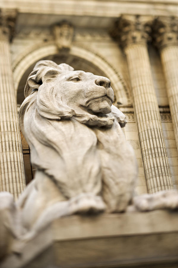 Statue of lion outside New York Public Library, New York City, NY Photograph by Thinkstock