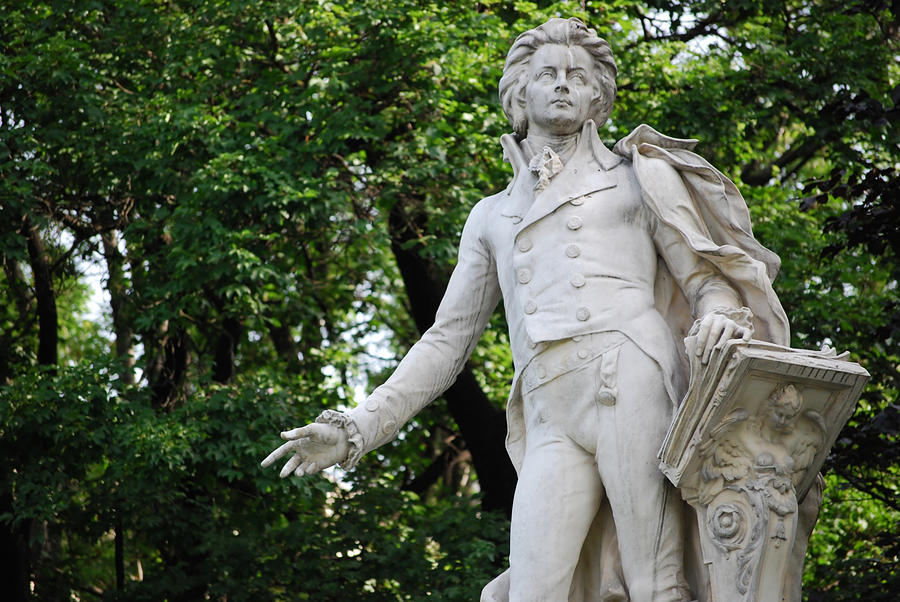 Statue of Mozart in front of trees Photograph by Nikoniaiii