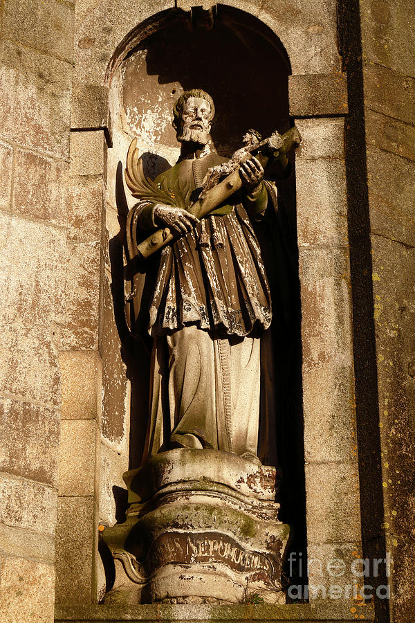 Statue on the Se do Porto cathedral Portugal Photograph by James Brunker