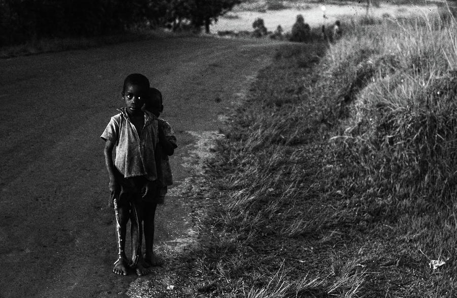 Stay clear stranger - two little boys in Africa Photograph by Jeremy Holton