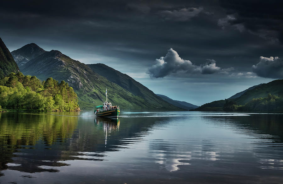 Steam boat on the lake Photograph by Remigiusz MARCZAK
