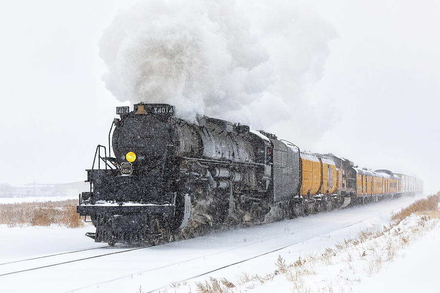Steam Engine Races Through a Snowstorm Photograph by Tony Hake