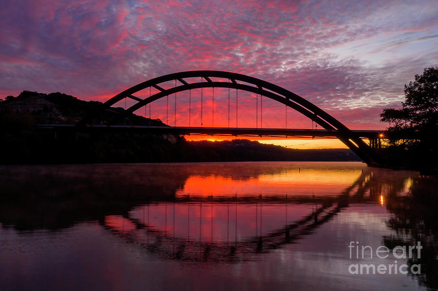 Sunset Photograph - Steam rolls off of Lake Austin under 360 Pennybacker Bridge during a beautiful sunrise by Dan Herron