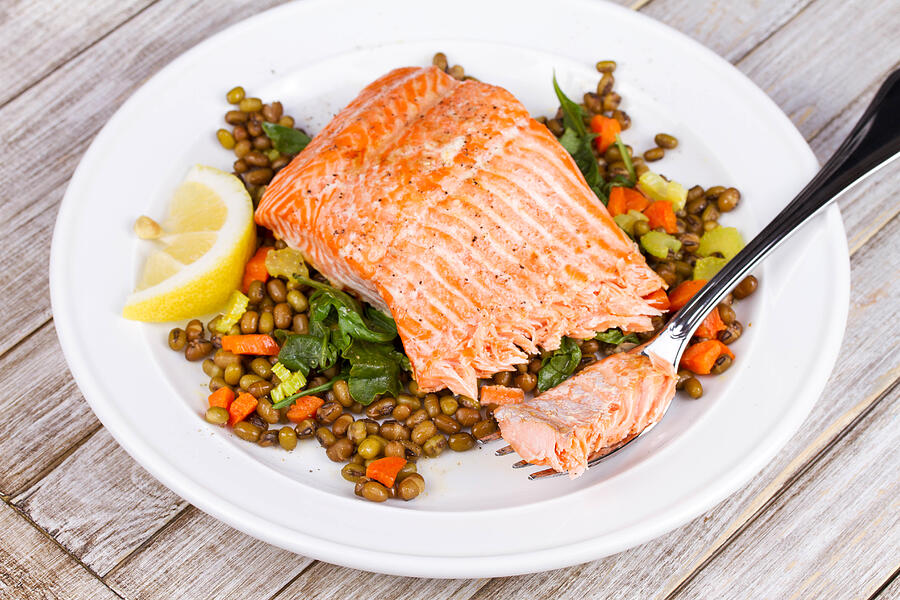 Steamed Salmon with Lentils and Arugula Photograph by Freeskyline