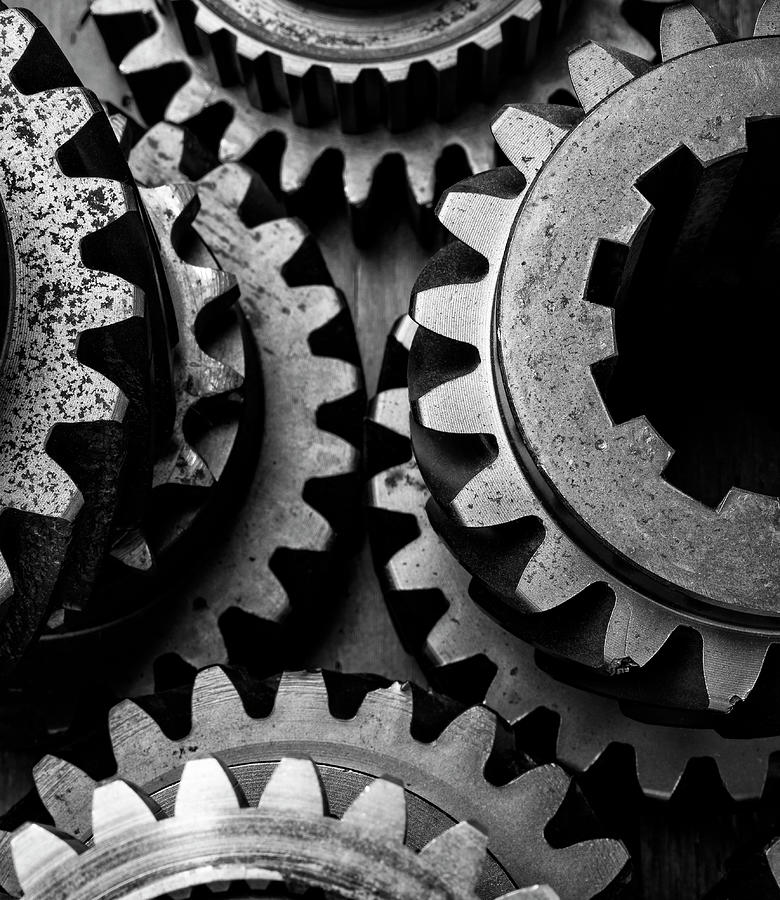 Black And White Photograph - Steel Gears Still Life by Garry Gay