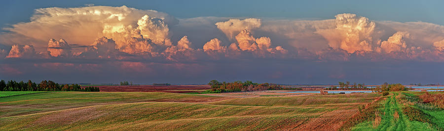 Stensby farm homestead site with vast stormcloud receding in distance Photograph by Peter Herman