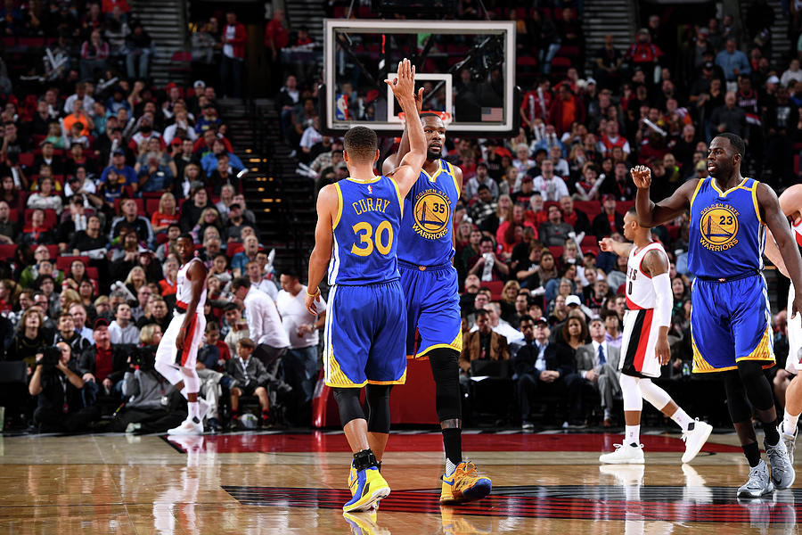 Stephen Curry and Kevin Durant Photograph by Garrett Ellwood