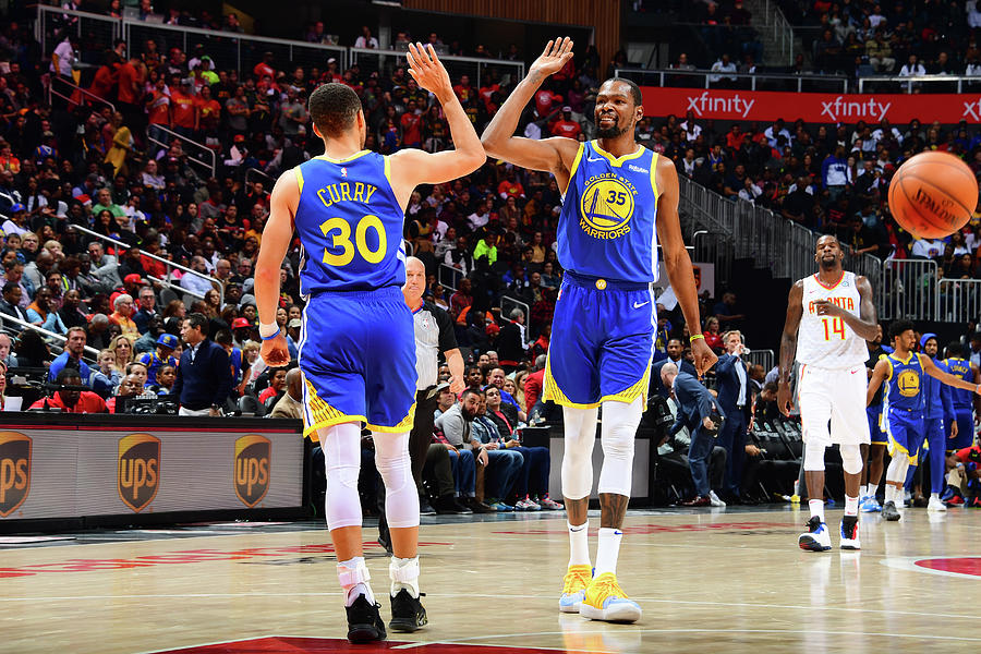 Stephen Curry and Kevin Durant Photograph by Scott Cunningham Stephen Curry and Kevin Durant Photograph by Scott Cunningham