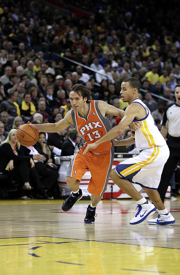 Stephen Curry and Steve Nash Photograph by Ezra Shaw