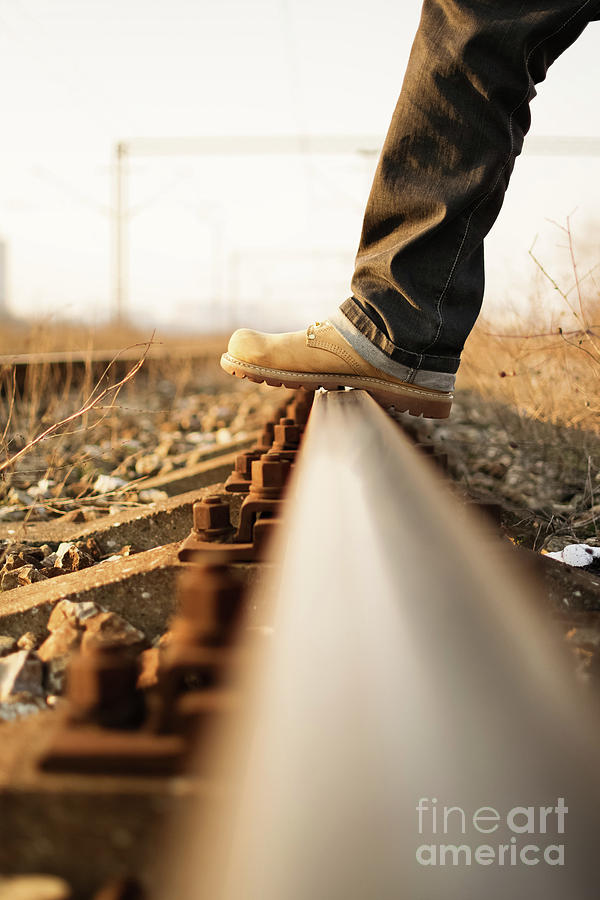 Stepping over the train tracks Photograph by Mendelex Photography