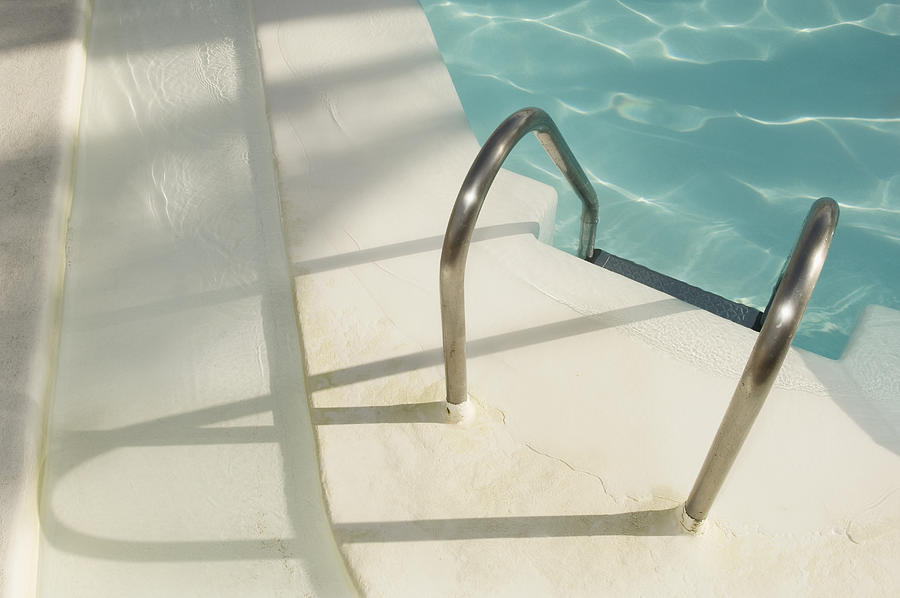 Steps Inn The Corner Of A Swimming Pool Photograph by Andre Lichtenberg