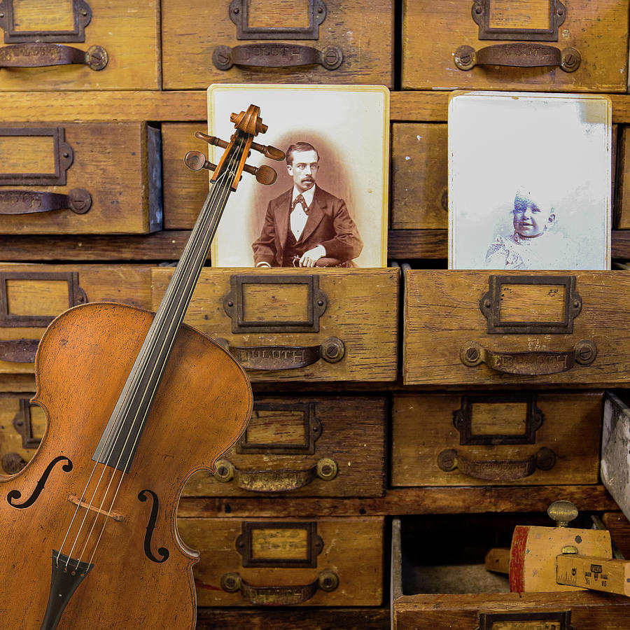 Still life - cabinet with violin Photograph by Jeff Burgess