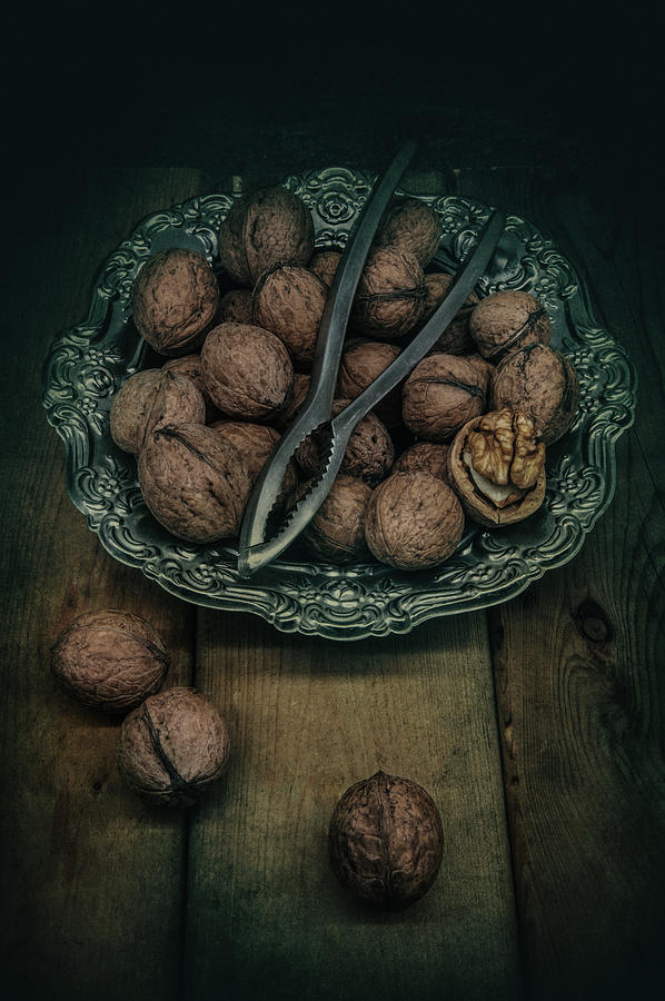 Still life with brown walnuts Photograph by Jaroslaw Blaminsky