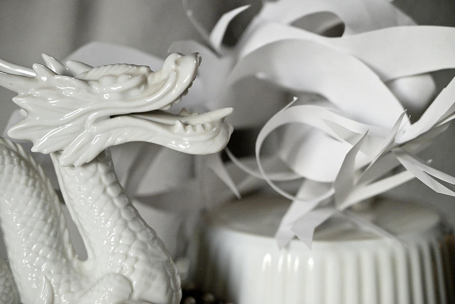 Still Life with Dragon and Paper Sculpture in White Photograph by Katherine Nutt