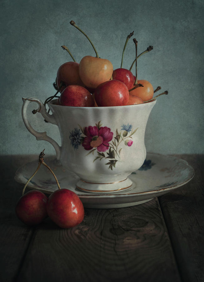 Still life with red and yellow cherries Photograph by Jaroslaw Blaminsky