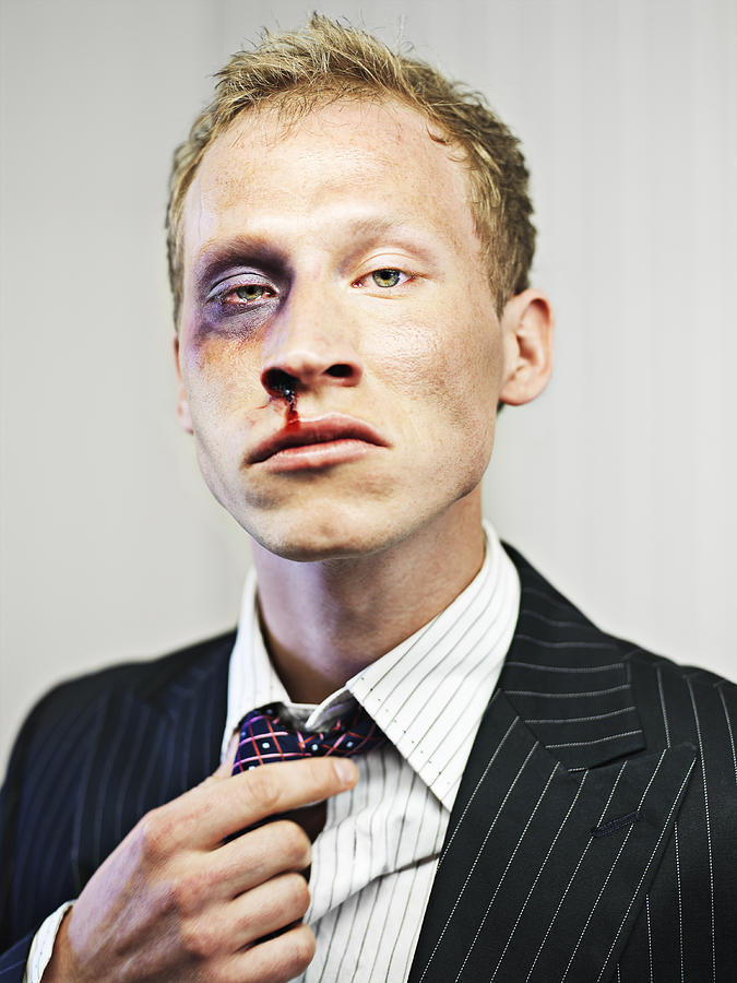 Stock market broker after a beating Photograph by David Trood