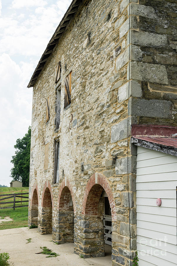 Stone bank barn, built 1832, at Woodlawn Manor in Sandy Spring,  Photograph by William Kuta