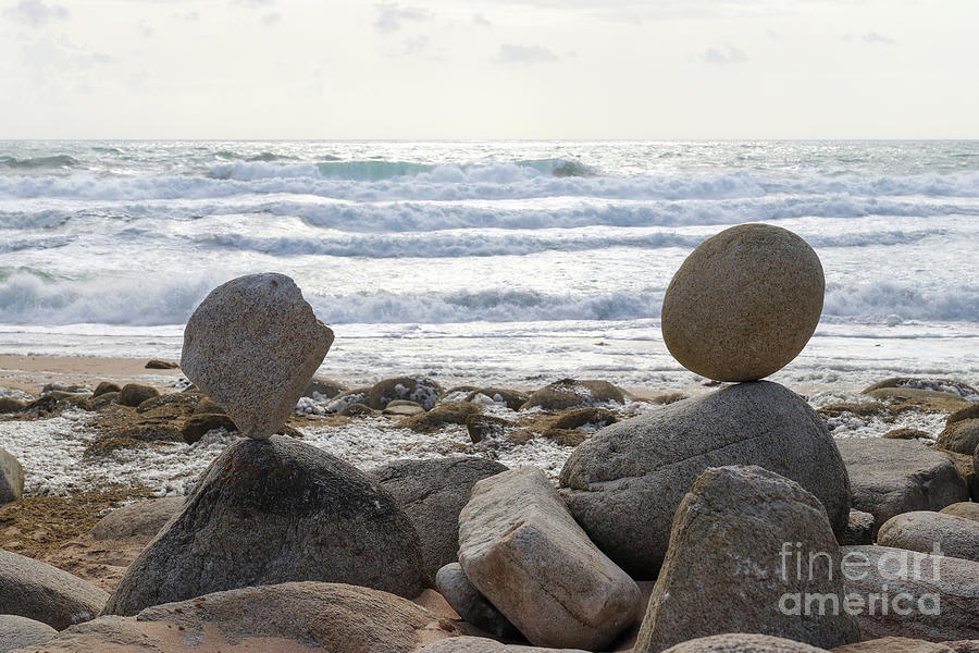 Stone pyramid on the beach Photograph by Michal Boubin