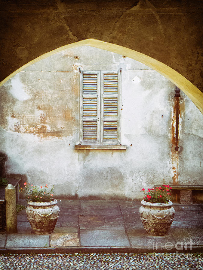 Stone vases and window Photograph by Silvia Ganora
