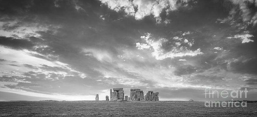 Stonehenge on the summer solstice black and white Photograph by Stefano Senise
