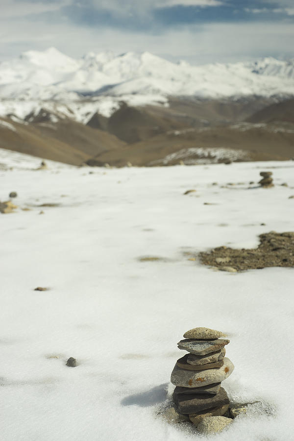 Stones balanced in the Himalayas Photograph by By Samantha Stocks