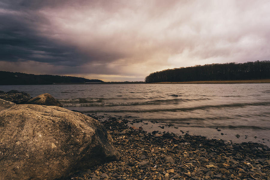 Stony Shores and Stormy Skies at Beltzville Lake Photograph by Jason Fink