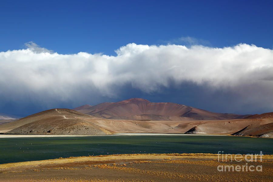 Storm cloud rising above Laguna Santa Rosa Chile Photograph by James Brunker