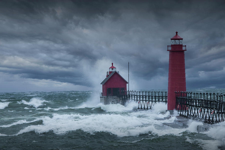 Storm Clouds and High Seas at the Grand Haven Lighthouse Photograph by Randall Nyhof