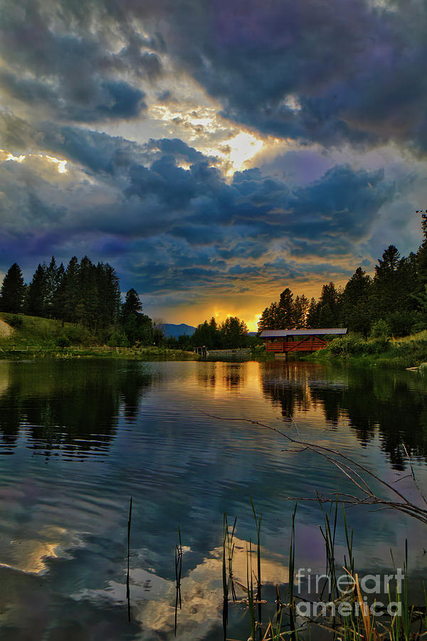 Storm clouds over the lake Photograph by Thomas Nay