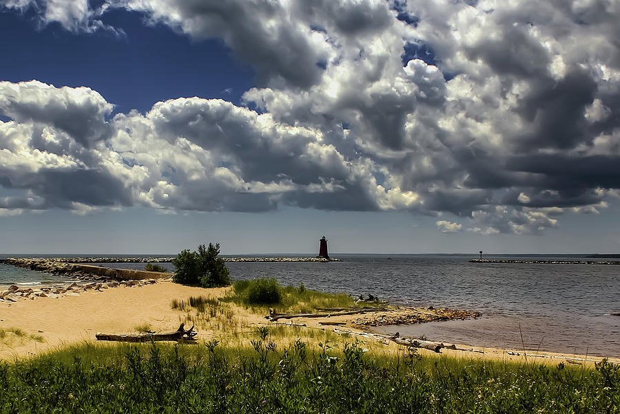 Storm Clouds Over the Manistique Light Photograph by Deb Beausoleil