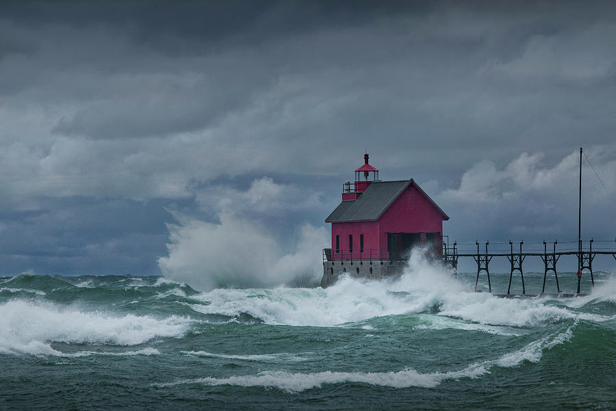 Storm Waves pounding the Grand Haven Lighthouse Photograph by Randall Nyhof