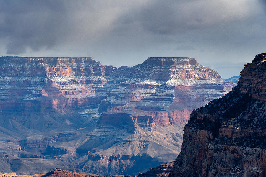Stormy Clouds over a Wintery Grand Canyon  Photograph by Geno Lee