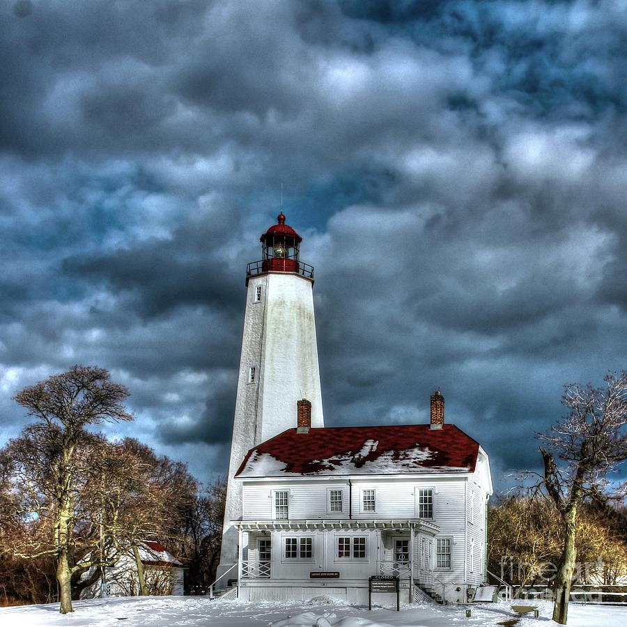 Stormy Clouds Over Sandy Hook Lighthouse Photograph by Brad Knorr ...