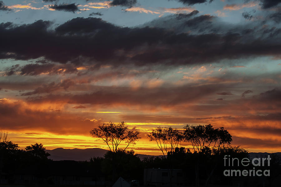 Stormy Sunset Photograph by John Bartelt