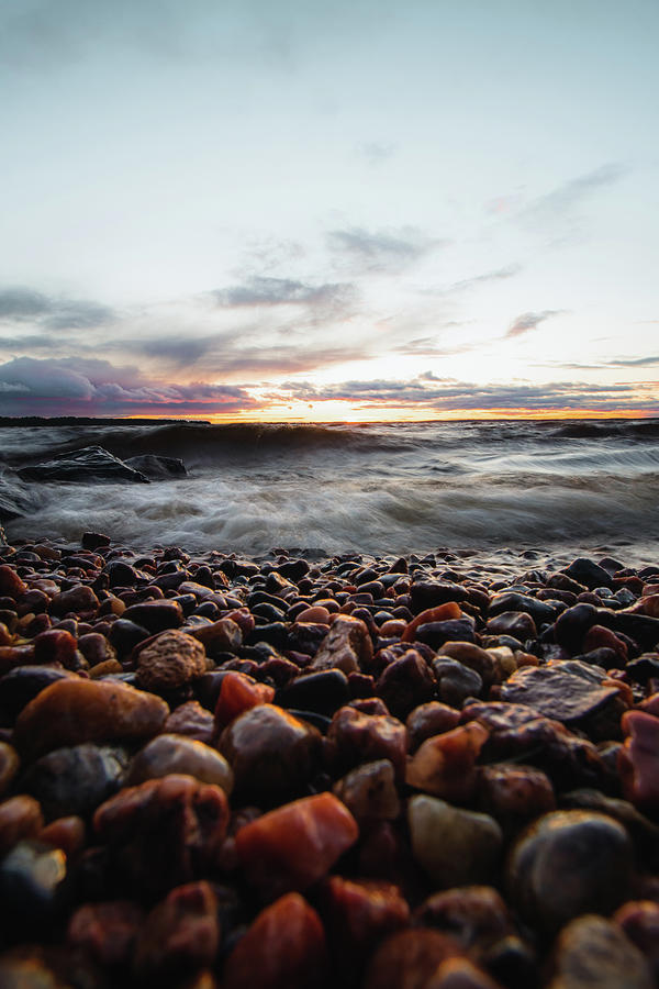 Stormy tide on coloured pebbles Photograph by Vaclav Sonnek