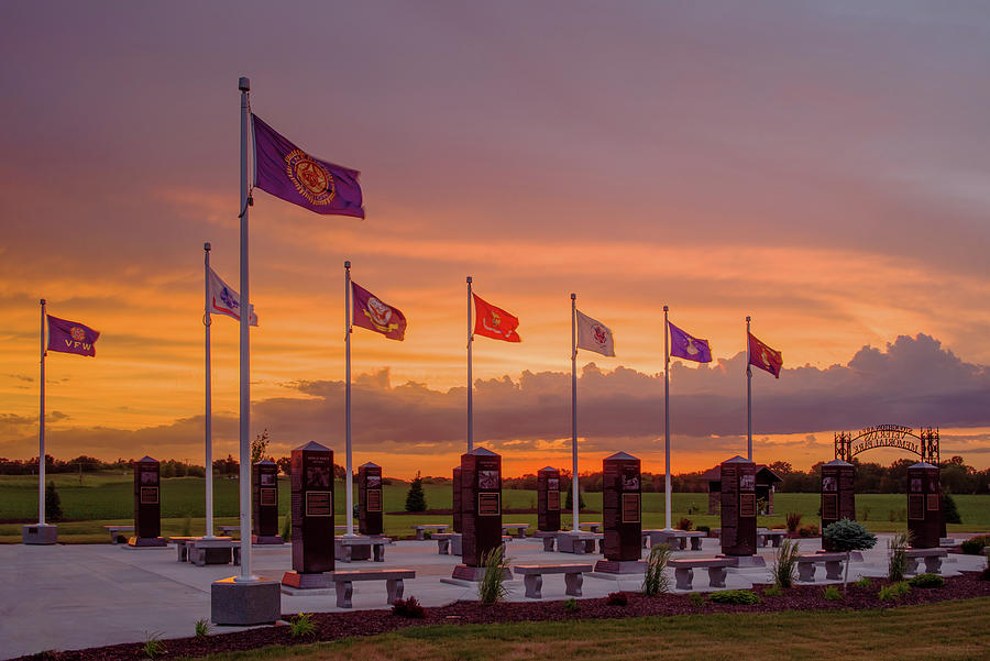 Stoughton Veterans Memorial - Scene with Flags at sunset Photograph by Peter Herman