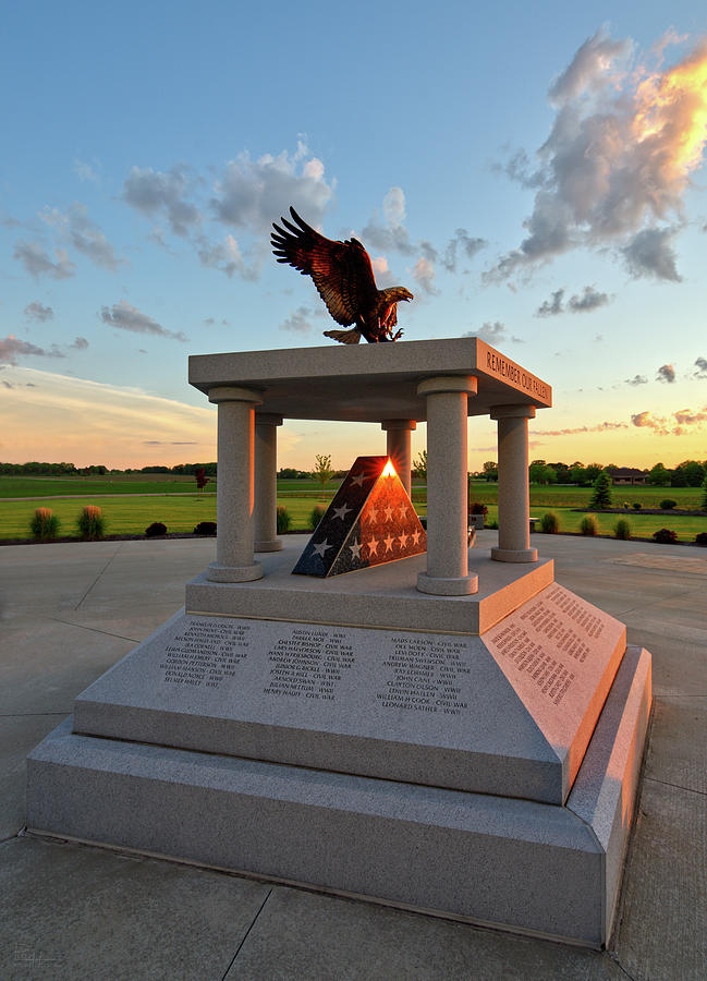 Stoughton Veterans Memorial - Sunset lit eagle and reflection in stone Photograph by Peter Herman