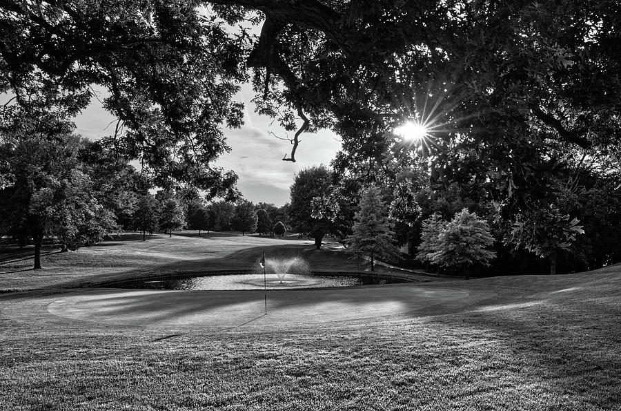 Golf Photograph - Stoughton WI Country Club - Looking uprange at #9 green with pond and fountain at sunset by Peter Herman